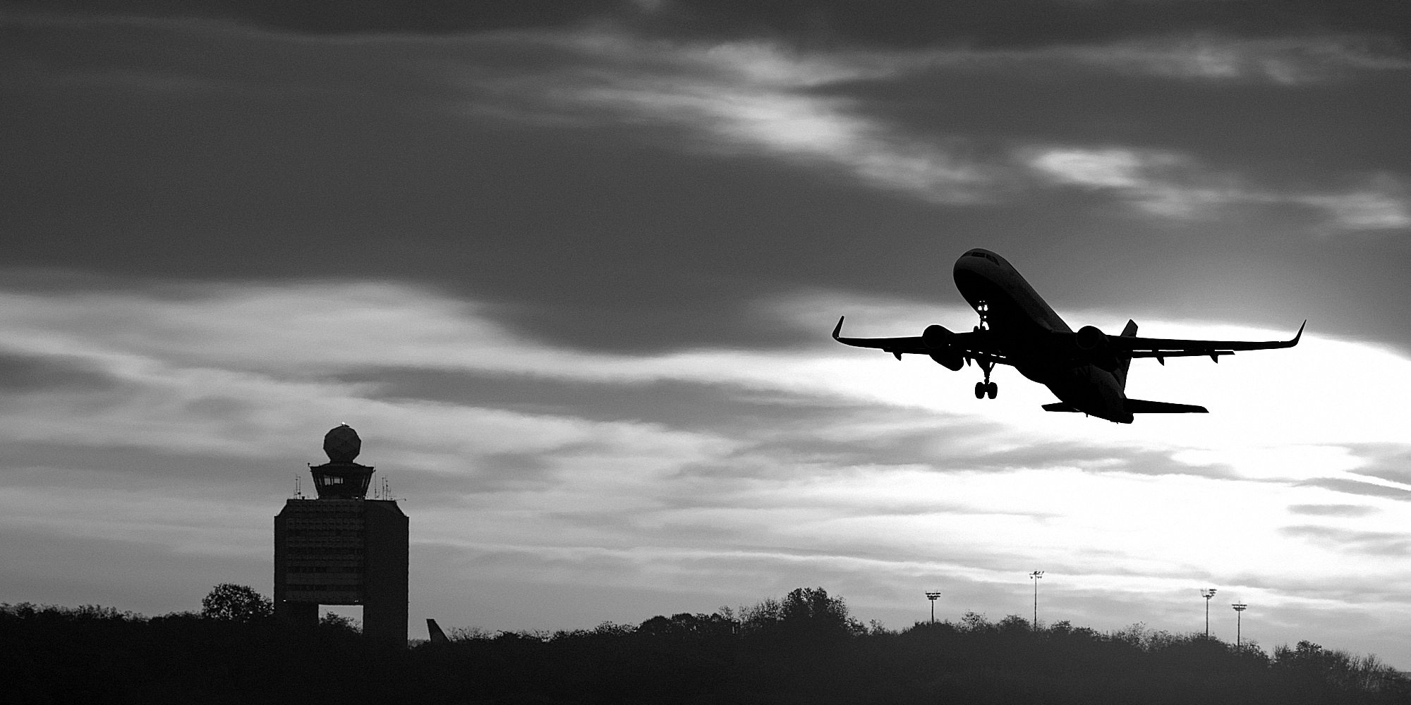 Zwart-wit footer image met take off